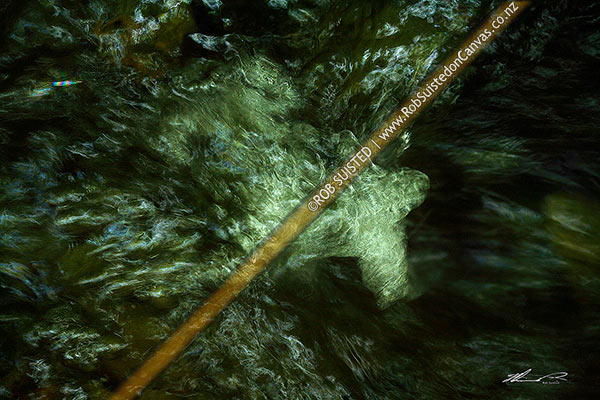 Photo of Aerated stream water flowing in blurred abstract pattern and texture,, New Zealand (NZ)