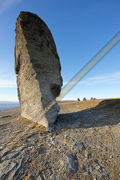 Photo of Obelisk, a well known rock outcrop landmark on the Old Man Range (1682m), looking east over Central Otago and Clutha country, Alexandra, Central Otago, Otago Region, New Zealand (NZ)