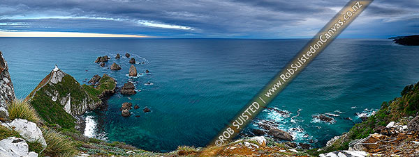 Photo of Nuggets Lighthouse at dusk. Nugget point and Tokata Point left and Long Point right, Catlins. South Otago Panorama, Catlins, Clutha, Otago Region, New Zealand (NZ)