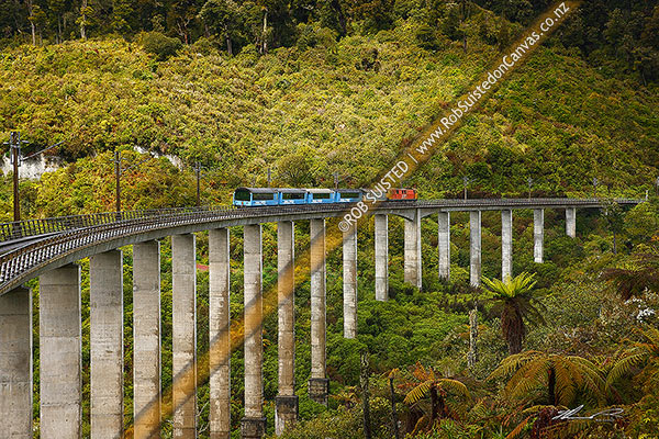 Photo of Hapuawhenua Viaduct with electirc locomotive and Overlander train, in Tongairo National Park on the North Island Main Trunk Railway Line (NIMT). Span 932ft, height 147ft, Ohakune, Ruapehu, Manawatu-Wanganui Region, New Zealand (NZ)