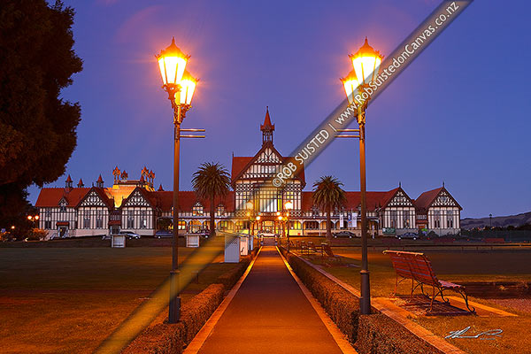 Photo of Tudor Bath house, Historic Government House and gardens (now Rotorua Museum) lit up at twilight, Rotorua, Rotorua, Bay of Plenty Region, New Zealand (NZ)