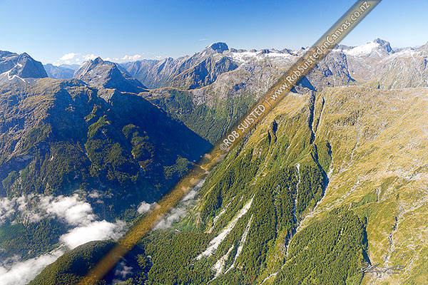 Photo of Milford Track Great Walk aerial photo. Mackinnon Pass centre left, and Arthur River valley below., Milford Sound, Fiordland National Park, Southland, Southland Region, New Zealand (NZ)