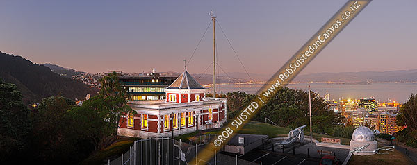 Photo of Historic Dominion Observatory built 1907 in Edwardian Baroque style to house the time service. The Krupp gun and Garden Battery to right. Panorama over harbour at dusk, Wellington, Wellington City, Wellington Region, New Zealand (NZ)