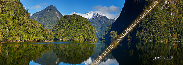 Photo of Doubtful Sound on a perfect winters day. Looking up Hall Arm past Davidson Head to Mt Danae. Panorama, Doubtful Sound, Fiordland National Park, Southland, Southland Region, New Zealand (NZ)