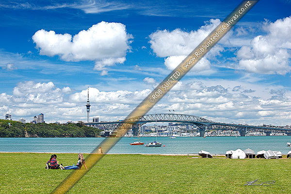Photo of Auckland City, Harbour bridge and Sky Tower from the North Shore, with people enjoying sunny weather, Auckland, North Shore City, Auckland Region, New Zealand (NZ)