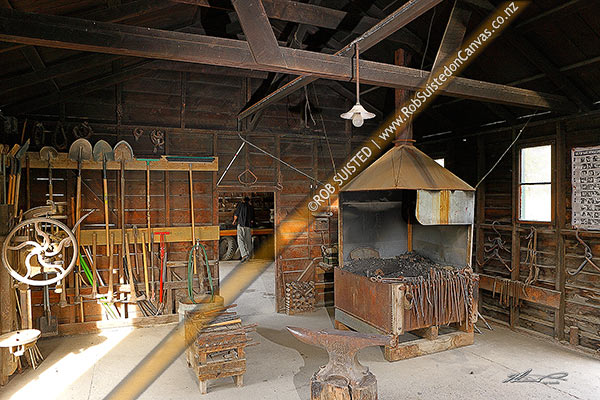 Photo of Blacksmith tools, anvil and forge inside the smithy, Molesworth Station, Marlborough, Marlborough Region, New Zealand (NZ)