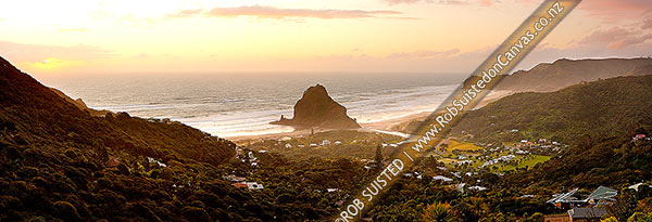 Photo of Piha Beach with Lion Rock prominent in the small west coast village surrounded by the Waitakere ranges at sunset. Te Waha Point and Kohunui Bay distant. Panorama, Piha Beach, Auckland, Waitakere City, Auckland Region, New Zealand (NZ)