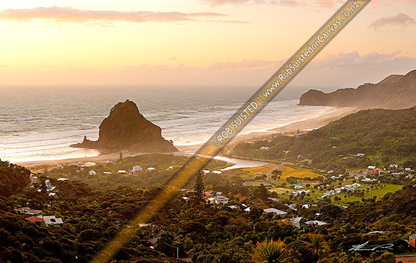 Photo of Piha Beach with Lion Rock prominent in the small west coast village surrounded by the Waitakere ranges at sunset. Te Waha Point and Kohunui Bay distant, Piha Beach, Auckland, Waitakere City, Auckland Region, New Zealand (NZ)