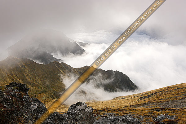 Photo of Kepler Track Great walk track view from Mount Luxmore on a moody misty morning with low cloud over Lake Te Anau, Fiordland National Park, Southland, Southland Region, New Zealand (NZ)
