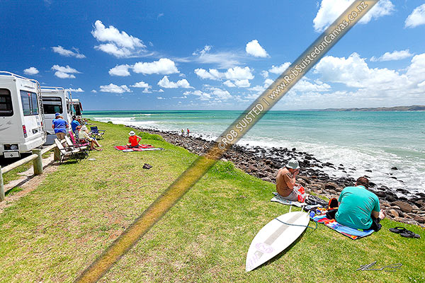 Photo of Manu Bay surf break with surfers and spectators enjoying the summer sun, Raglan, Waikato, Waikato Region, New Zealand (NZ)