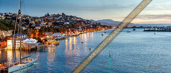 Photo of Nelson waterfront at twilight. Wakefield Quay with cafes, restaurants, wharves and sailboats, below desirable Nelson hillside homes. Panorama, Nelson, Nelson City, Nelson Region, New Zealand (NZ)