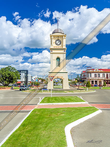 Photo of Feilding clock tower in the middle of town. Feilding Hotel behind, Feilding, Manawatu, Manawatu-Wanganui Region, New Zealand (NZ)