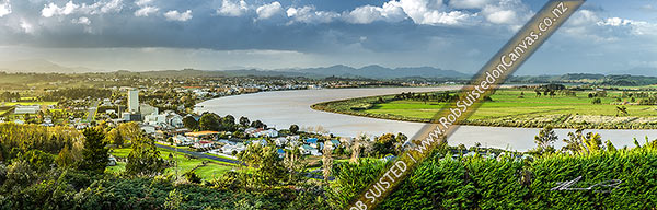 Photo of Dargaville township on the tidal Wairoa River, with the Tangihua Ranges in distance. Evening panorama, Dargaville, Kaipara, Northland Region, New Zealand (NZ)