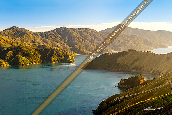 Photo of French Pass (Te Aumiti) channel between D'Urville Island (left) and French Pass (Anaru) at dawn. Channel Basin and Man-o-War Bay foreground, French Pass, Marlborough Sounds, Marlborough, Marlborough Region, New Zealand (NZ)