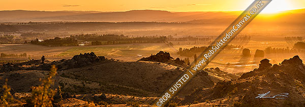Photo of Central Otago sunrise over Earnscleugh and Blackmans, with Alexandra and the Clutha (Mata-Au) River plains beyond. Panorama, Alexandra, Central Otago, Otago Region, New Zealand (NZ)