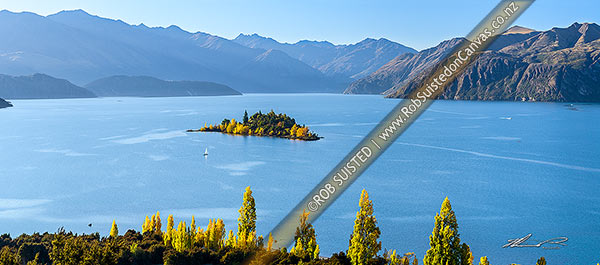Photo of Lake Wanaka in autumn colours, with small boats enjoying a fine autumn day. Panorama, Wanaka, Queenstown Lakes, Otago Region, New Zealand (NZ)