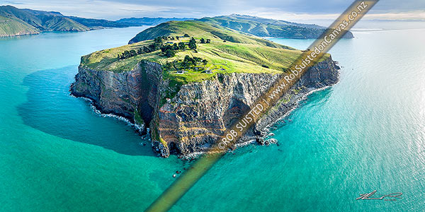 Photo of Godley Head Awaroa at entrance of Lyttelton Harbour (Whakaraupo), left. Historic gun emplacements reserve centre. Sumner Head and Christchurch at right. Aerial panorama, Godley Head, Christchurch City, Canterbury Region, New Zealand (NZ)