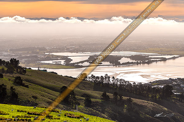 Photo of Christchurch City, looking over the Heathcoate Avon estuary as weather change brings fog. Southern Alps beyond. Seen from The Port Hills, Christchurch, Christchurch City, Canterbury Region, New Zealand (NZ)