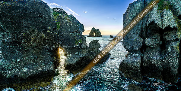 Photo of Motukoruenga Island and rocks, with Needle Island behind centre. Hole in the rock in Hole in the Wall channel. Panorama, Opito Bay, Coromandel Peninsula, Thames-Coromandel, Waikato Region, New Zealand (NZ)