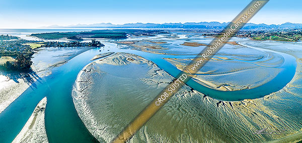 Photo of Waimea Inlet estuary, with Mapua (left), Grossi Point, Rabbit Island Rough Island and Nelson beyond. Aerial panorama over sand and mudflats at low tide, Mapua, Tasman, Tasman Region, New Zealand (NZ)