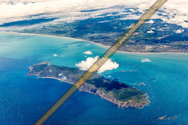 Photo of Kapiti Island Nature Reserve separated off Paraparaumu by Rauoterangi Channel (Otehake Strait). Aerial view, Kapiti Island, Kapiti Coast, Wellington Region, New Zealand (NZ)