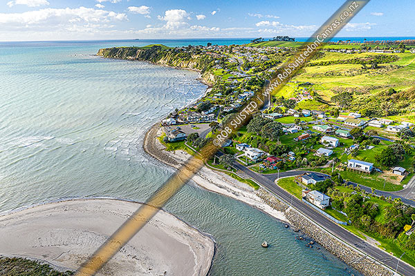 Photo of Maketu township on the waterfront of the Maketu Harbour estuary mouth. Okurei Point beyond. Aerial view, Maketu, Western Bay of Plenty, Bay of Plenty Region, New Zealand (NZ)