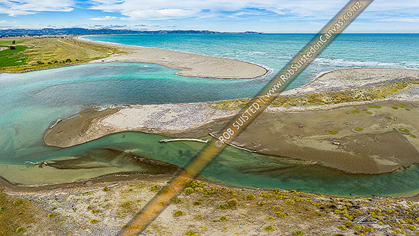 Photo of Waipaoa River mouth into Povery Bay. Gisborne and Tuaheni Point beyond. Aerial view, Poverty Bay, Gisborne, Gisborne Region, New Zealand (NZ)