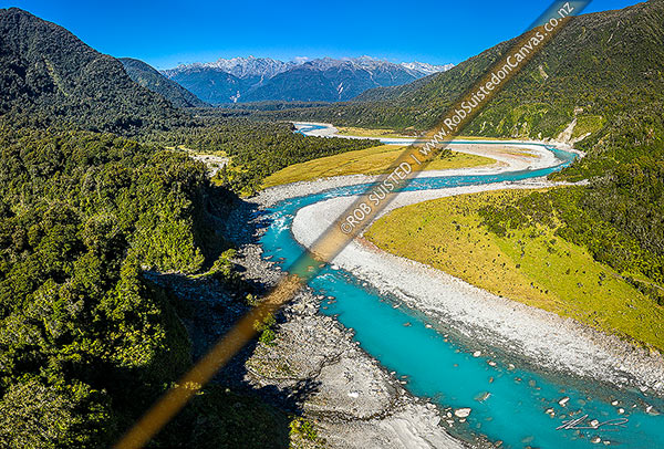 Photo of Whataroa River and river flats with the Butler Range mountains beyond. Other than small parcel of river flats, all is Stewardship land. Aerial view, Whataroa, Westland, West Coast Region, New Zealand (NZ)