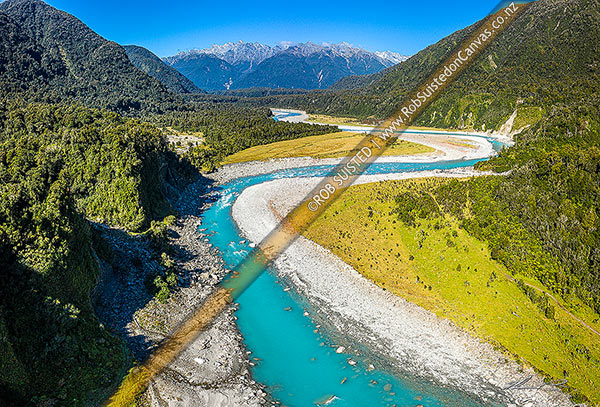 Photo of Whataroa River and river flats with the Butler Range mountains beyond. Other than small parcel of river flats, all is Stewardship land. Aerial view, Whataroa, Westland, West Coast Region, New Zealand (NZ)